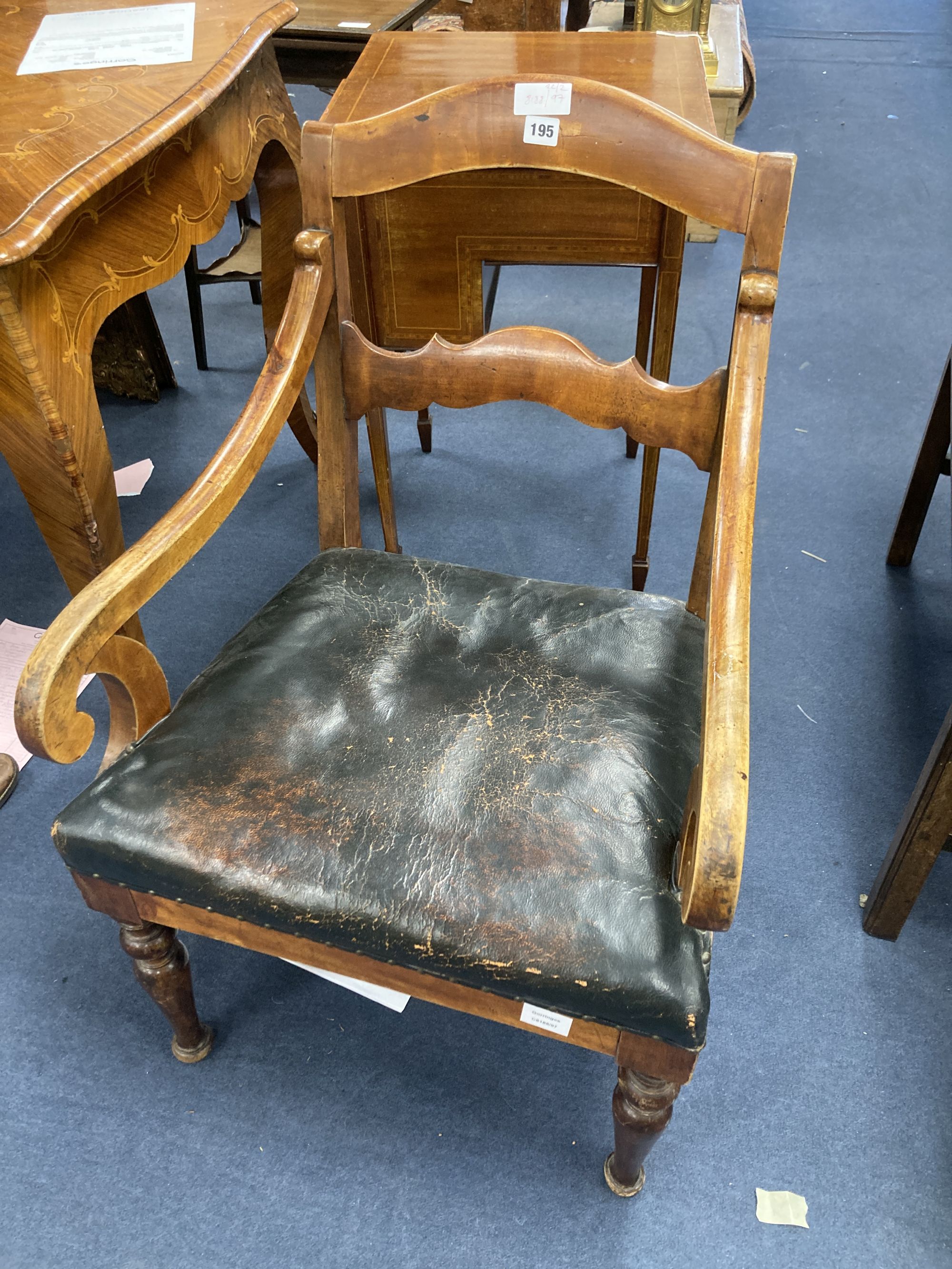 A 19th century Swedish fruitwood elbow chair